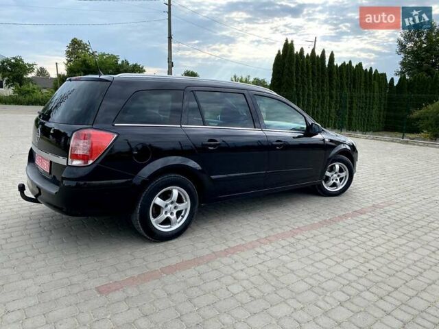 Черный Опель Астра, объемом двигателя 1.6 л и пробегом 222 тыс. км за 5200 $, фото 35 на Automoto.ua