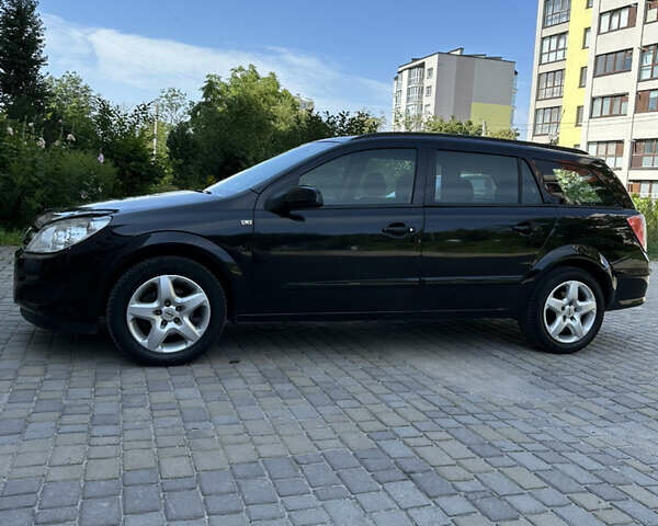 Черный Опель Астра, объемом двигателя 1.6 л и пробегом 188 тыс. км за 5650 $, фото 5 на Automoto.ua
