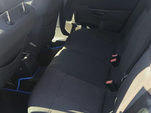 Черный Опель Астра, объемом двигателя 1.6 л и пробегом 226 тыс. км за 5900 $, фото 7 на Automoto.ua