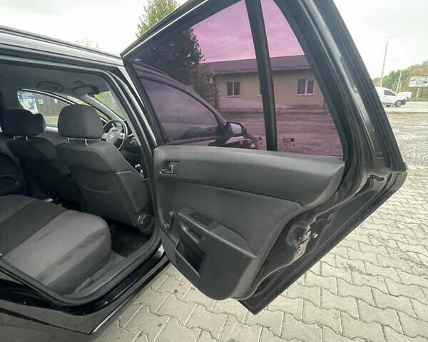 Черный Опель Астра, объемом двигателя 1.6 л и пробегом 281 тыс. км за 5200 $, фото 22 на Automoto.ua