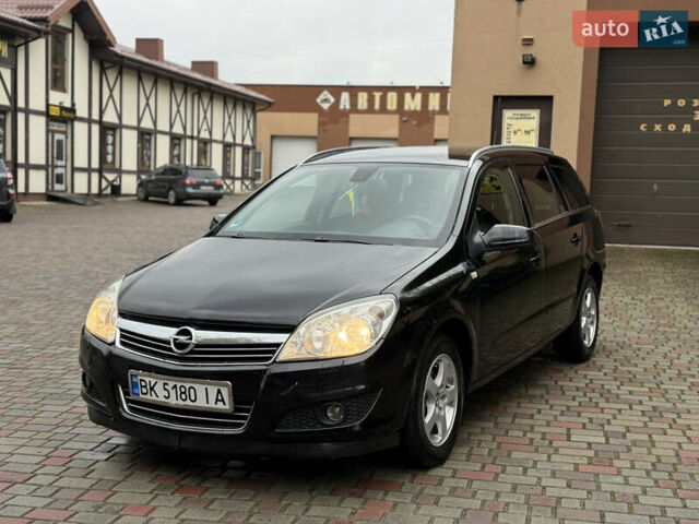 Черный Опель Астра, объемом двигателя 1.69 л и пробегом 330 тыс. км за 4700 $, фото 2 на Automoto.ua