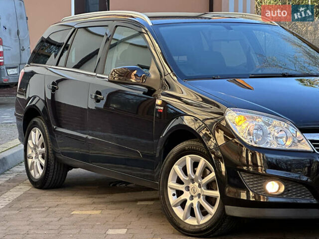 Черный Опель Астра, объемом двигателя 1.6 л и пробегом 180 тыс. км за 5499 $, фото 65 на Automoto.ua