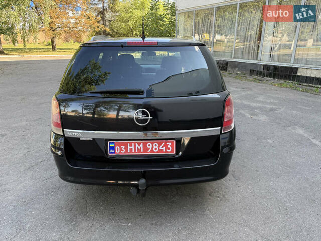 Черный Опель Астра, объемом двигателя 1.6 л и пробегом 219 тыс. км за 6000 $, фото 11 на Automoto.ua