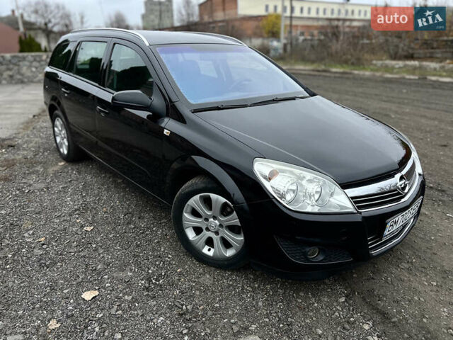 Черный Опель Астра, объемом двигателя 1.8 л и пробегом 209 тыс. км за 5600 $, фото 6 на Automoto.ua