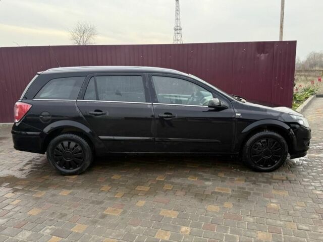 Черный Опель Астра, объемом двигателя 1.7 л и пробегом 240 тыс. км за 2800 $, фото 7 на Automoto.ua