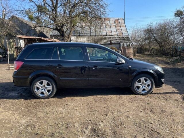 Черный Опель Астра, объемом двигателя 1.6 л и пробегом 295 тыс. км за 4850 $, фото 1 на Automoto.ua