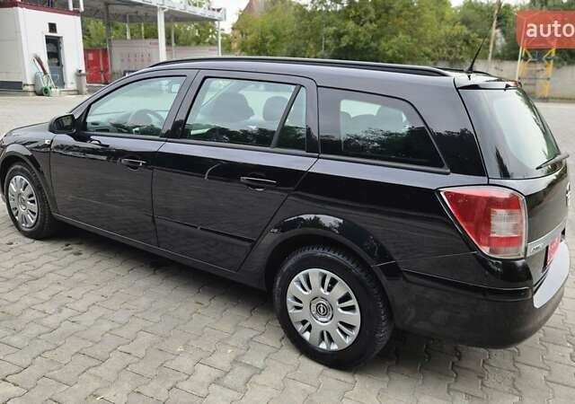 Черный Опель Астра, объемом двигателя 1.6 л и пробегом 209 тыс. км за 5850 $, фото 18 на Automoto.ua