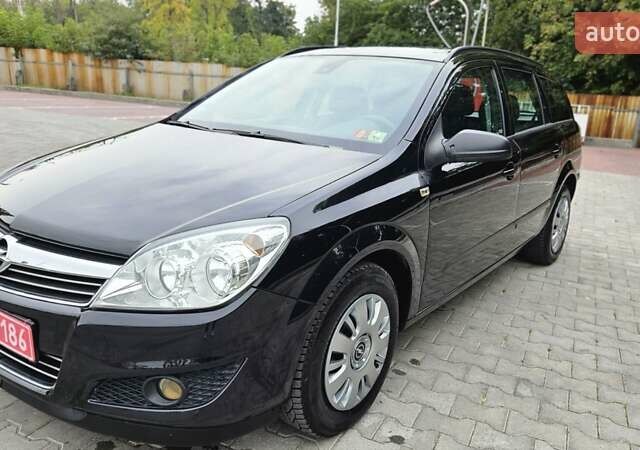 Черный Опель Астра, объемом двигателя 1.6 л и пробегом 209 тыс. км за 5850 $, фото 5 на Automoto.ua