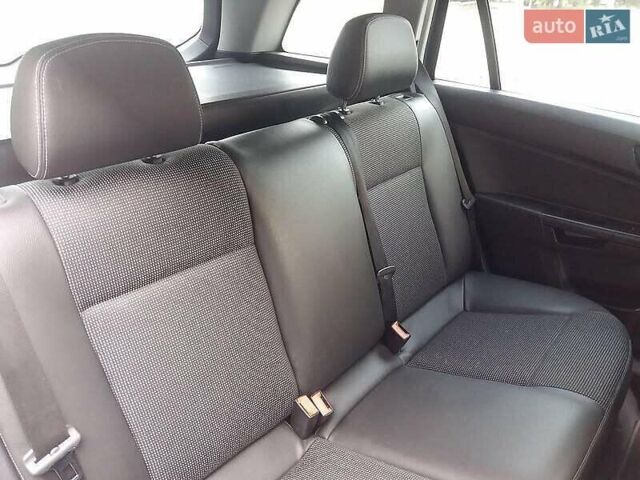 Черный Опель Астра, объемом двигателя 1.6 л и пробегом 191 тыс. км за 5550 $, фото 12 на Automoto.ua