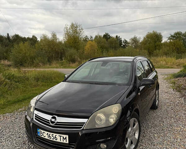Черный Опель Астра, объемом двигателя 1.9 л и пробегом 254 тыс. км за 5100 $, фото 1 на Automoto.ua