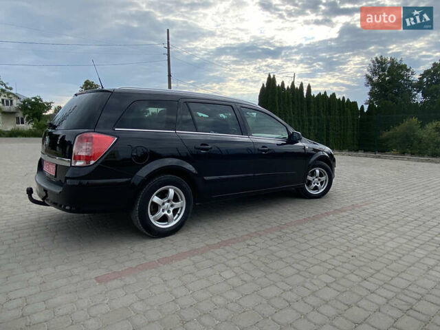 Черный Опель Астра, объемом двигателя 1.6 л и пробегом 224 тыс. км за 5200 $, фото 3 на Automoto.ua