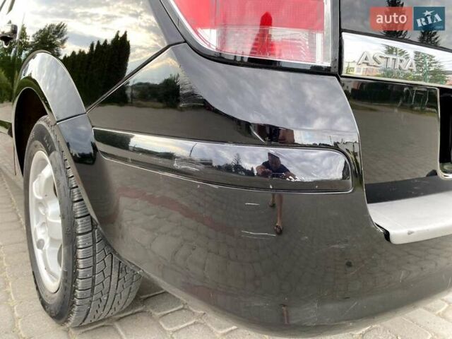 Черный Опель Астра, объемом двигателя 1.6 л и пробегом 222 тыс. км за 5200 $, фото 15 на Automoto.ua