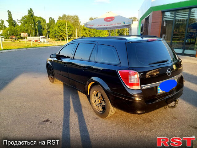 Черный Опель Астра, объемом двигателя 1.6 л и пробегом 225 тыс. км за 5500 $, фото 1 на Automoto.ua