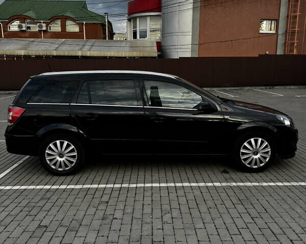 Черный Опель Астра, объемом двигателя 1.8 л и пробегом 405 тыс. км за 5500 $, фото 3 на Automoto.ua