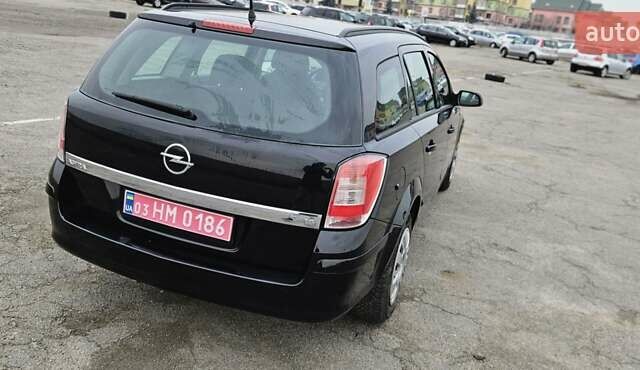 Черный Опель Астра, объемом двигателя 1.6 л и пробегом 210 тыс. км за 5850 $, фото 19 на Automoto.ua