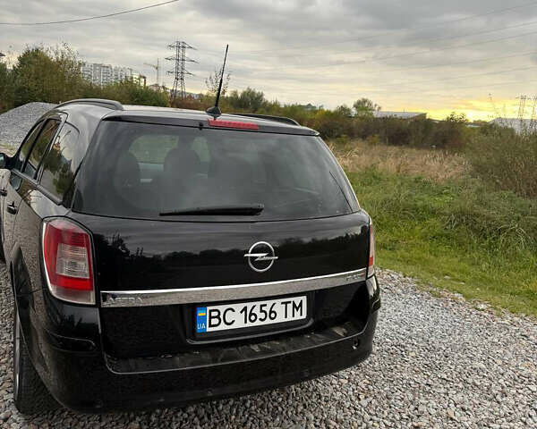 Черный Опель Астра, объемом двигателя 1.9 л и пробегом 254 тыс. км за 5100 $, фото 8 на Automoto.ua