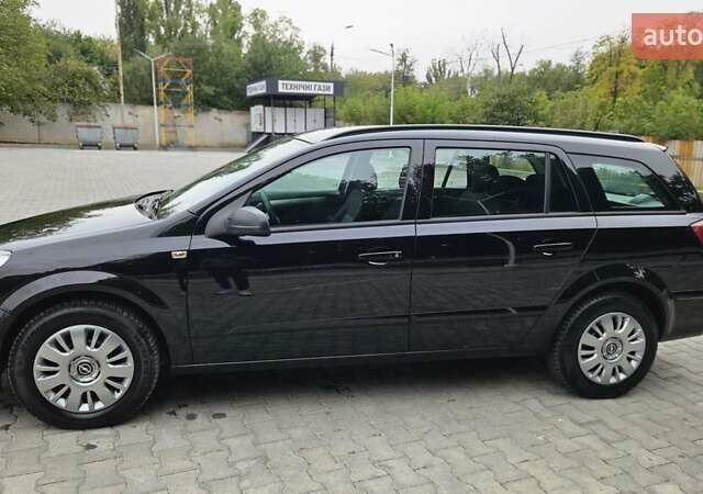 Черный Опель Астра, объемом двигателя 1.6 л и пробегом 209 тыс. км за 5850 $, фото 15 на Automoto.ua