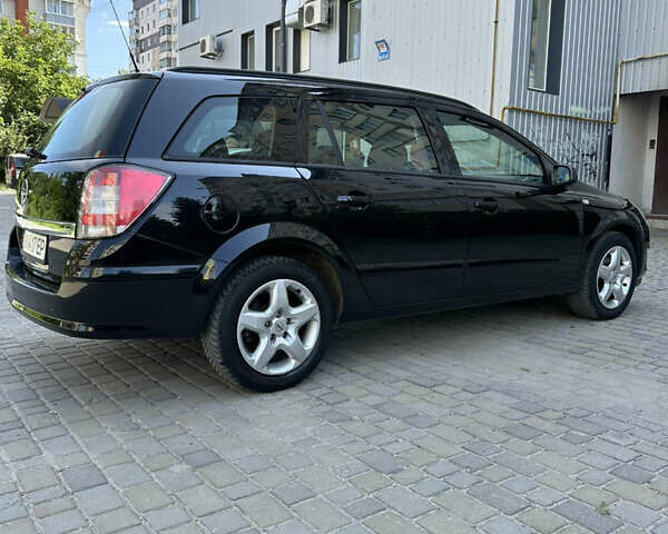 Черный Опель Астра, объемом двигателя 1.6 л и пробегом 188 тыс. км за 5650 $, фото 10 на Automoto.ua