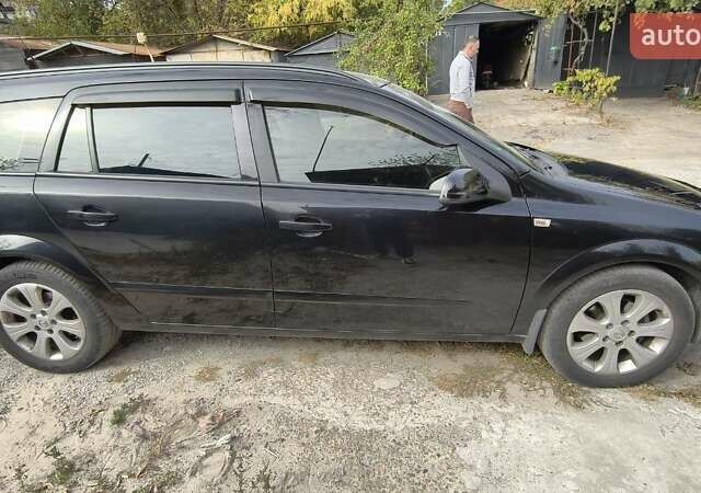 Черный Опель Астра, объемом двигателя 1.6 л и пробегом 267 тыс. км за 5500 $, фото 2 на Automoto.ua