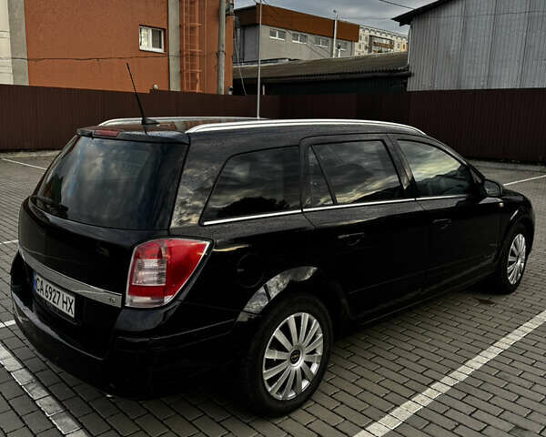 Черный Опель Астра, объемом двигателя 1.8 л и пробегом 405 тыс. км за 5500 $, фото 5 на Automoto.ua