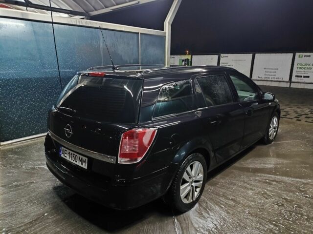 Черный Опель Астра, объемом двигателя 1.6 л и пробегом 226 тыс. км за 5900 $, фото 2 на Automoto.ua
