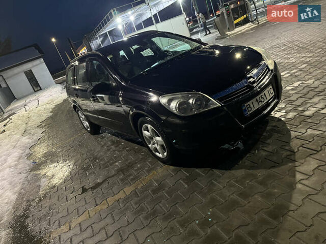 Черный Опель Астра, объемом двигателя 1.69 л и пробегом 270 тыс. км за 5500 $, фото 20 на Automoto.ua