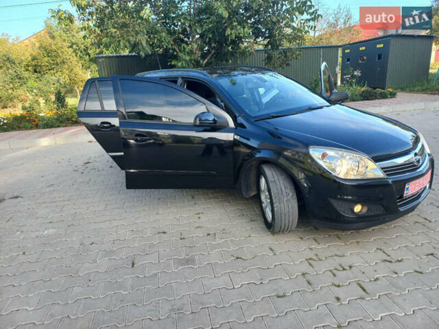 Черный Опель Астра, объемом двигателя 1.6 л и пробегом 260 тыс. км за 6000 $, фото 11 на Automoto.ua