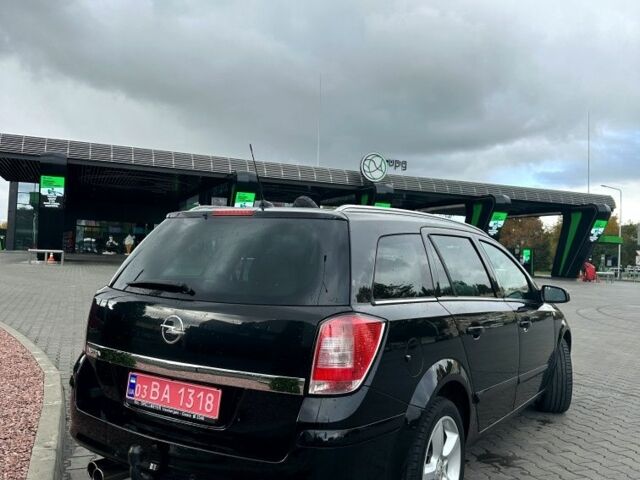 Черный Опель Астра, объемом двигателя 1.8 л и пробегом 225 тыс. км за 5800 $, фото 7 на Automoto.ua