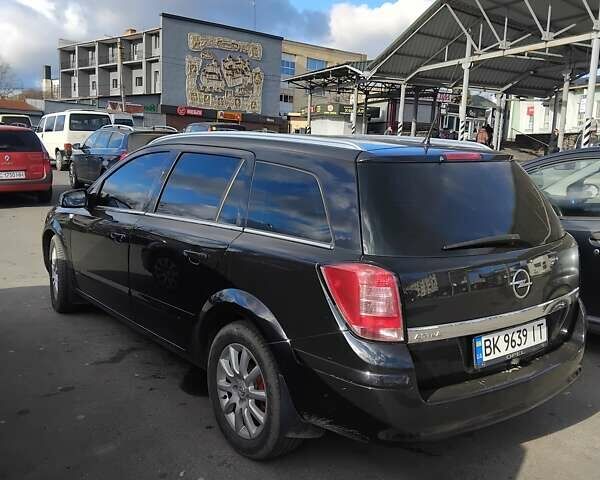 Черный Опель Астра, объемом двигателя 1.8 л и пробегом 222 тыс. км за 6800 $, фото 1 на Automoto.ua