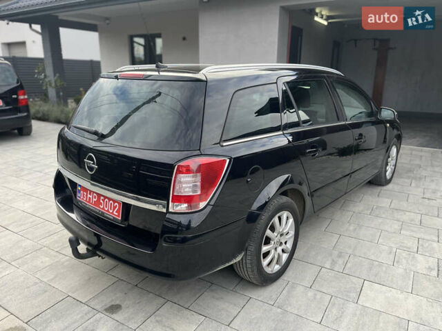 Чорний Опель Астра, об'ємом двигуна 1.6 л та пробігом 265 тис. км за 4700 $, фото 5 на Automoto.ua