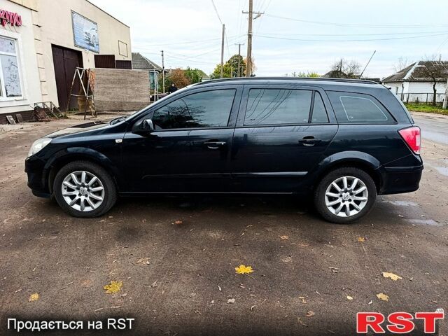 Черный Опель Астра, объемом двигателя 1.7 л и пробегом 300 тыс. км за 5250 $, фото 7 на Automoto.ua