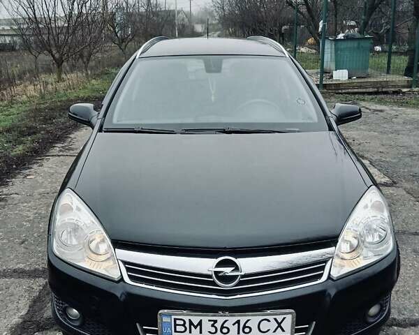 Черный Опель Астра, объемом двигателя 1.9 л и пробегом 262 тыс. км за 5500 $, фото 5 на Automoto.ua