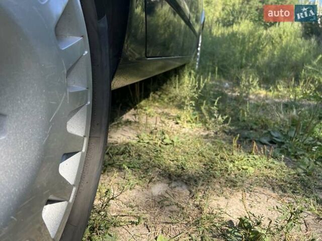 Черный Опель Астра, объемом двигателя 1.6 л и пробегом 243 тыс. км за 4500 $, фото 9 на Automoto.ua