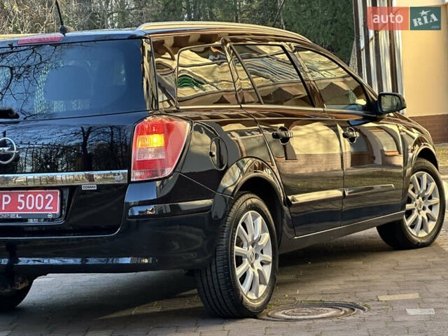 Черный Опель Астра, объемом двигателя 1.6 л и пробегом 180 тыс. км за 5499 $, фото 90 на Automoto.ua