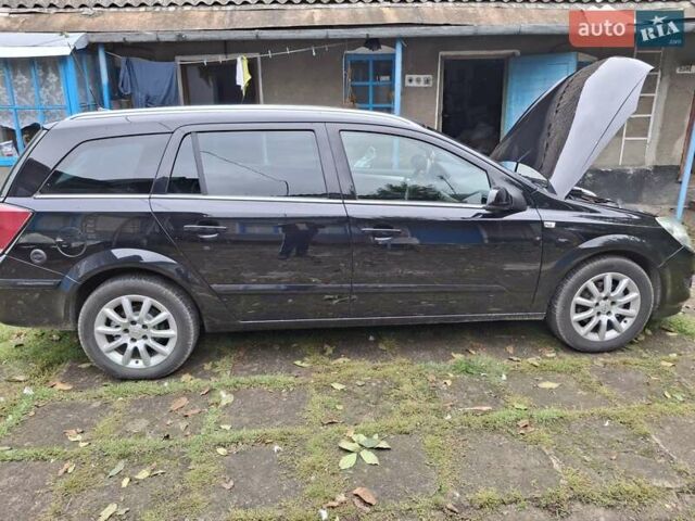 Чорний Опель Астра, об'ємом двигуна 1.6 л та пробігом 210 тис. км за 5950 $, фото 14 на Automoto.ua