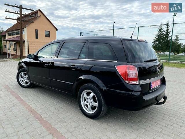 Черный Опель Астра, объемом двигателя 1.6 л и пробегом 222 тыс. км за 5200 $, фото 6 на Automoto.ua