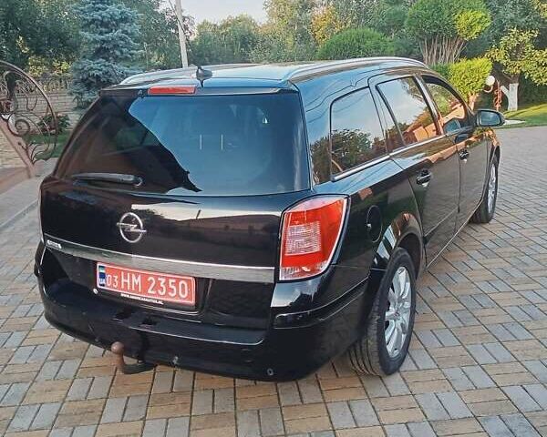 Черный Опель Астра, объемом двигателя 1.6 л и пробегом 227 тыс. км за 5750 $, фото 9 на Automoto.ua