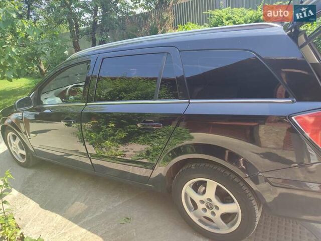 Черный Опель Астра, объемом двигателя 1.9 л и пробегом 287 тыс. км за 5400 $, фото 3 на Automoto.ua