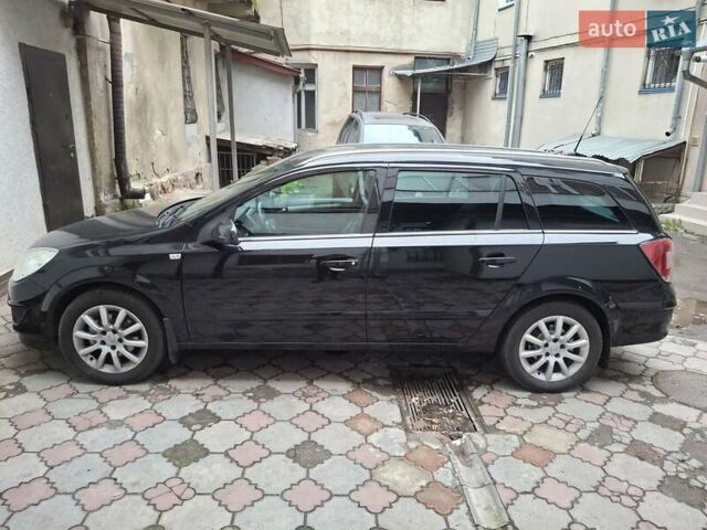 Чорний Опель Астра, об'ємом двигуна 1.6 л та пробігом 210 тис. км за 5950 $, фото 2 на Automoto.ua