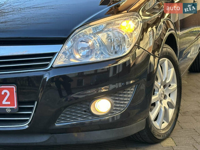 Черный Опель Астра, объемом двигателя 1.6 л и пробегом 180 тыс. км за 5499 $, фото 23 на Automoto.ua