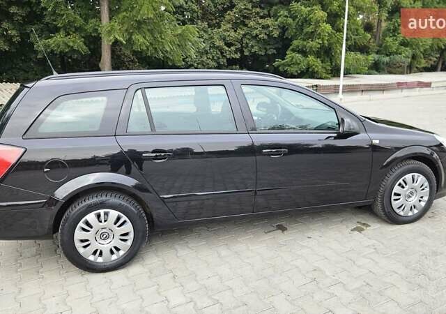 Черный Опель Астра, объемом двигателя 1.6 л и пробегом 209 тыс. км за 5850 $, фото 19 на Automoto.ua