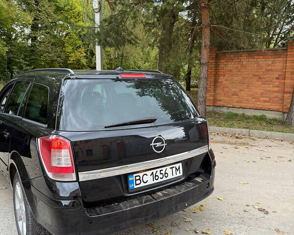 Черный Опель Астра, объемом двигателя 1.9 л и пробегом 254 тыс. км за 5100 $, фото 11 на Automoto.ua
