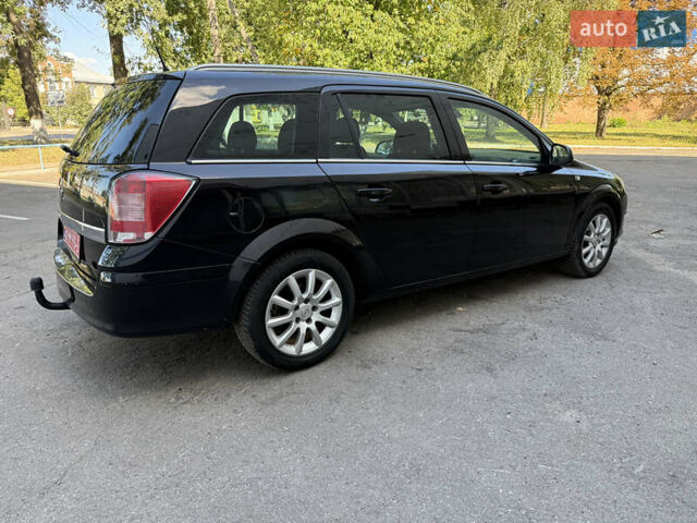 Черный Опель Астра, объемом двигателя 1.6 л и пробегом 219 тыс. км за 6000 $, фото 1 на Automoto.ua