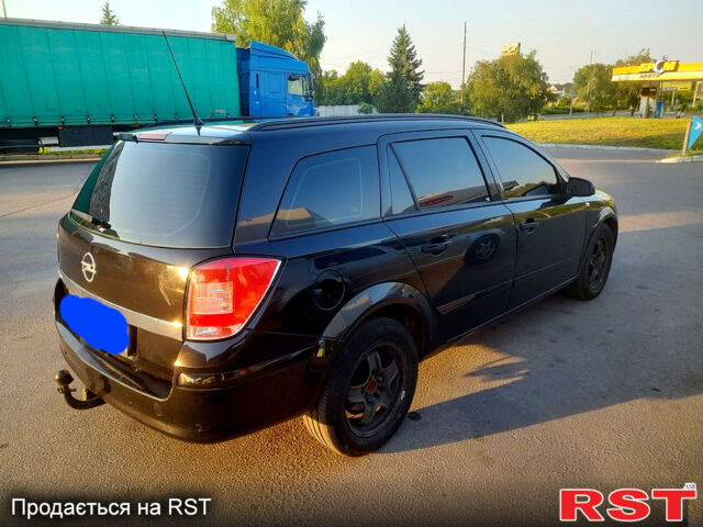 Черный Опель Астра, объемом двигателя 1.6 л и пробегом 225 тыс. км за 5500 $, фото 2 на Automoto.ua