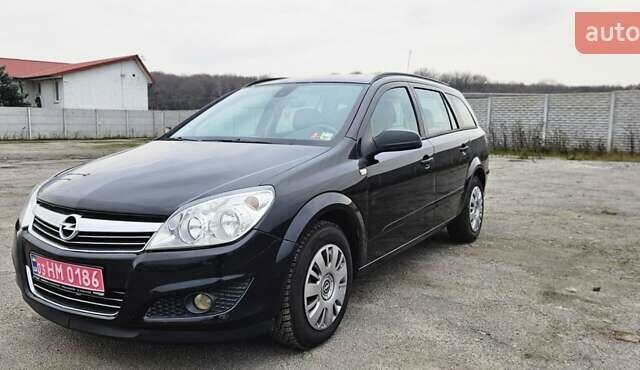 Черный Опель Астра, объемом двигателя 1.6 л и пробегом 210 тыс. км за 5850 $, фото 1 на Automoto.ua