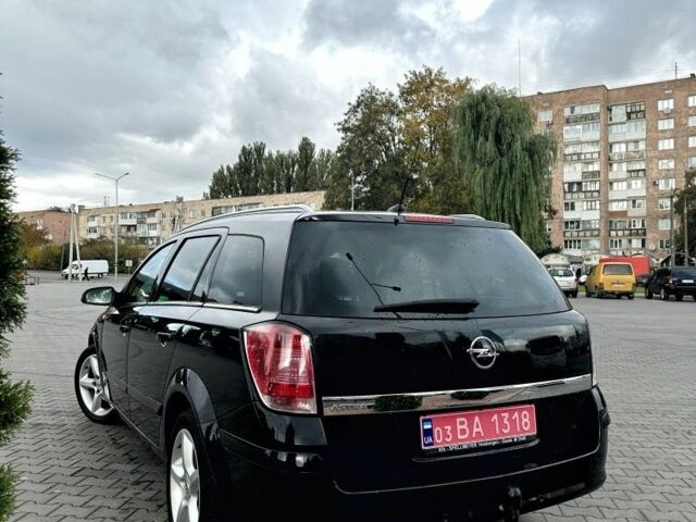 Черный Опель Астра, объемом двигателя 1.8 л и пробегом 225 тыс. км за 5800 $, фото 6 на Automoto.ua