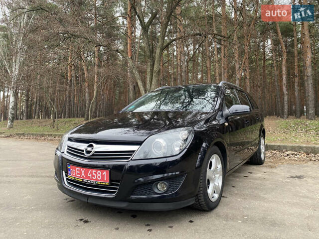 Черный Опель Астра, объемом двигателя 1.6 л и пробегом 194 тыс. км за 5800 $, фото 12 на Automoto.ua