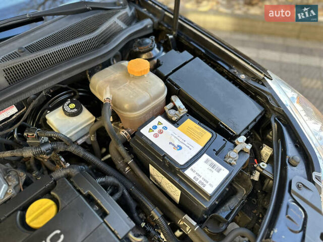 Черный Опель Астра, объемом двигателя 1.6 л и пробегом 180 тыс. км за 5499 $, фото 190 на Automoto.ua