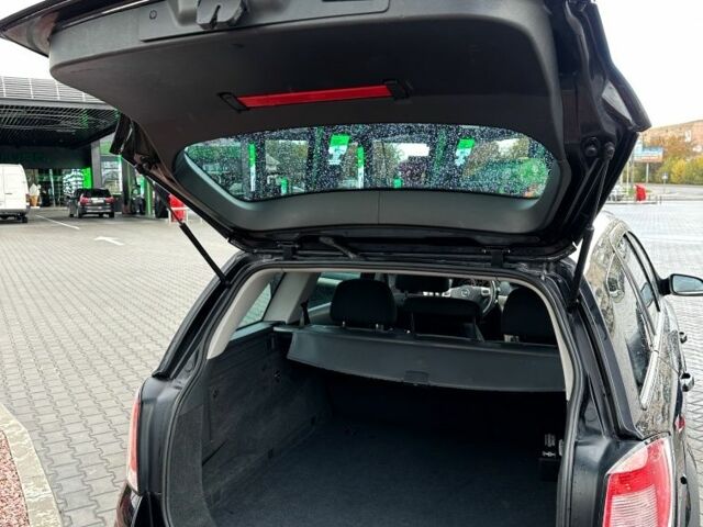 Черный Опель Астра, объемом двигателя 1.8 л и пробегом 225 тыс. км за 5800 $, фото 18 на Automoto.ua