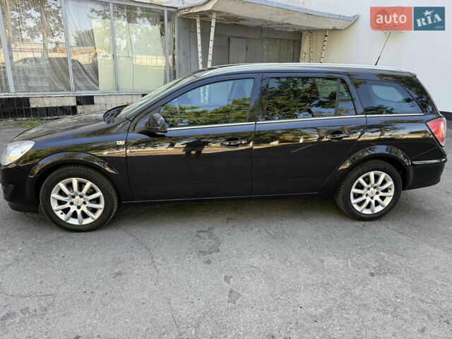 Черный Опель Астра, объемом двигателя 1.6 л и пробегом 219 тыс. км за 6000 $, фото 2 на Automoto.ua